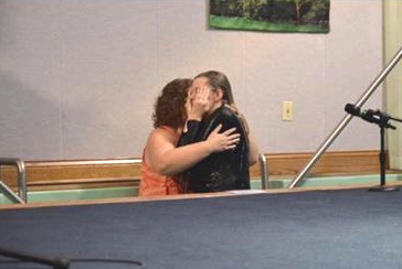 Photo: A layperson baptizes a new believer at Highview. Baptism_Highview_small