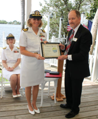 Photo: Ryan Chapman awards Chaplain Kim House on behalf of Church of God Ministries. KimHouse_and_RyanChapman_crop_FORWEB
