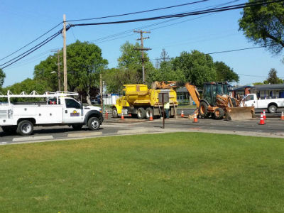 Photo: Construction from the church, with the high school in the background.