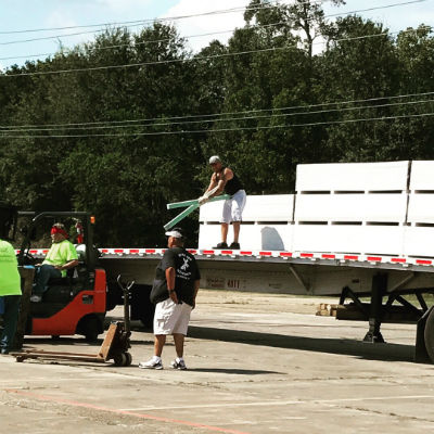 Photo: CHOG Albuquerque team members unloading material in Texas.