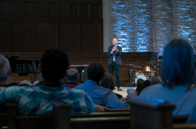 Photo: Jim Lyon speaks at the OKC Regional Convention on Tuesday.