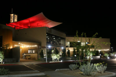 Photo: Mountain Park Church (Phoenix) illuminated at night.