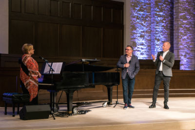 Photo: Sandi Patty, Don Peslis, and Jim Lyon share a moment of joy in OKC.