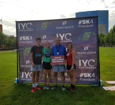 Photo: Runners pause to celebrate their completion of the 5K For Freedom!