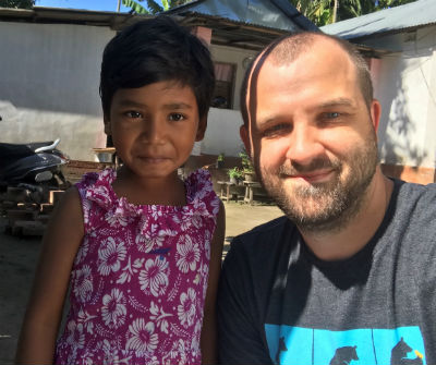 Photo: Marcus with his Children of Promise-sponsored child in India.