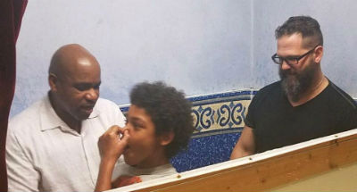 Photo: Pastor Handel and Pastor Micah celebrating new life in baptism.