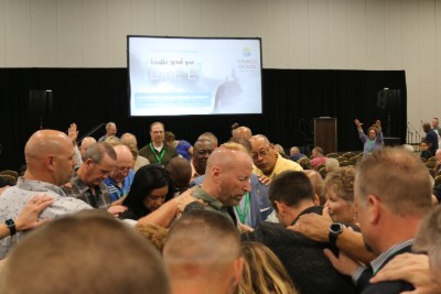 Photo: Impromptu prayer for Jim Lyon at Thursday's Town Hall.