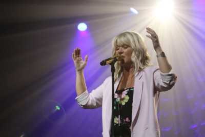 Photo: Natalie Grant leading in worship on Thursday night.