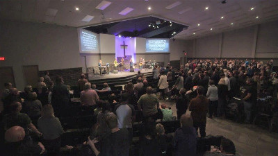 Photo: Packed auditorium for worship at Eastside - Swift Current.
